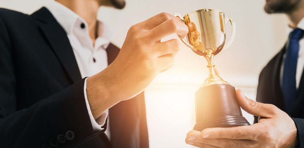 Person accepting trophy award