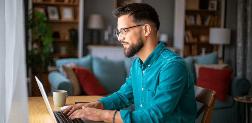 Person on computer using AI overview tools for research
