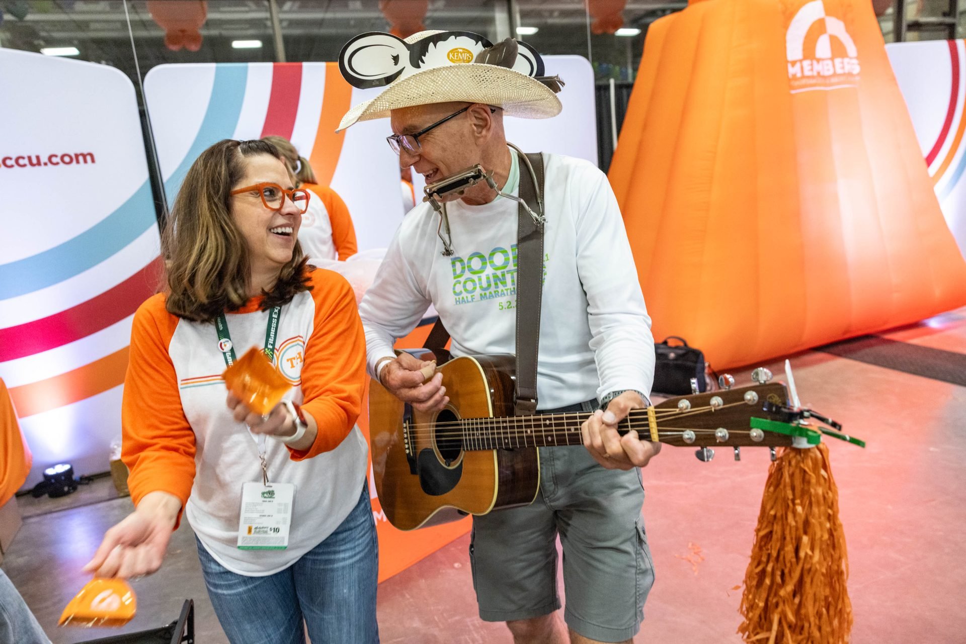 Dancing to live guitar at the Members booth.